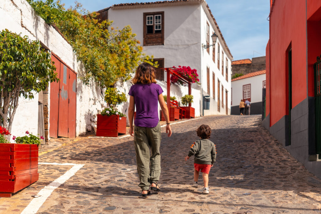 Mother and son visiting the village of Agulo in the north of La Gomera on vacation, Canary Islands